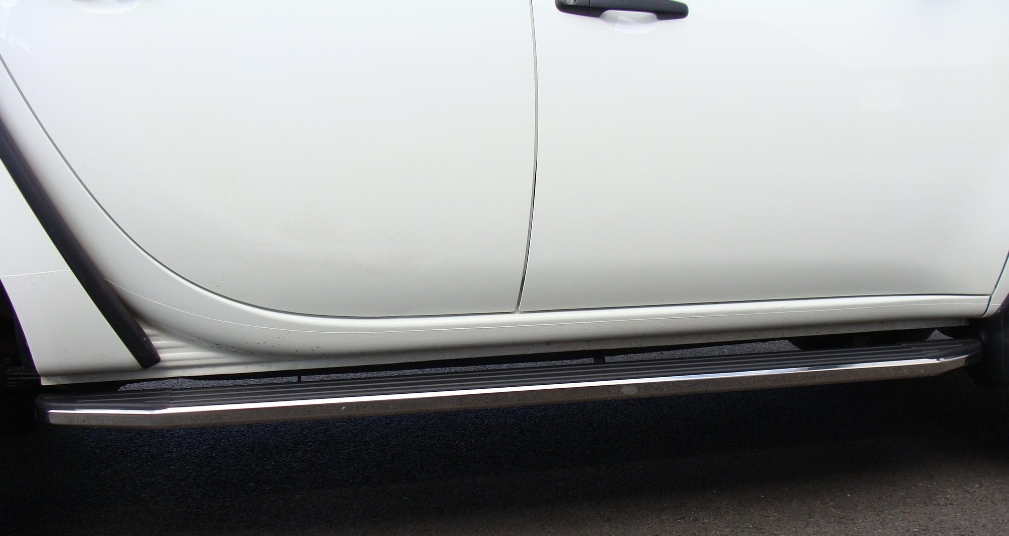 Mitsubishi L200 Bj. 05-15 Trittbretter "Raptor" - Direct 4x4 Autozubehör