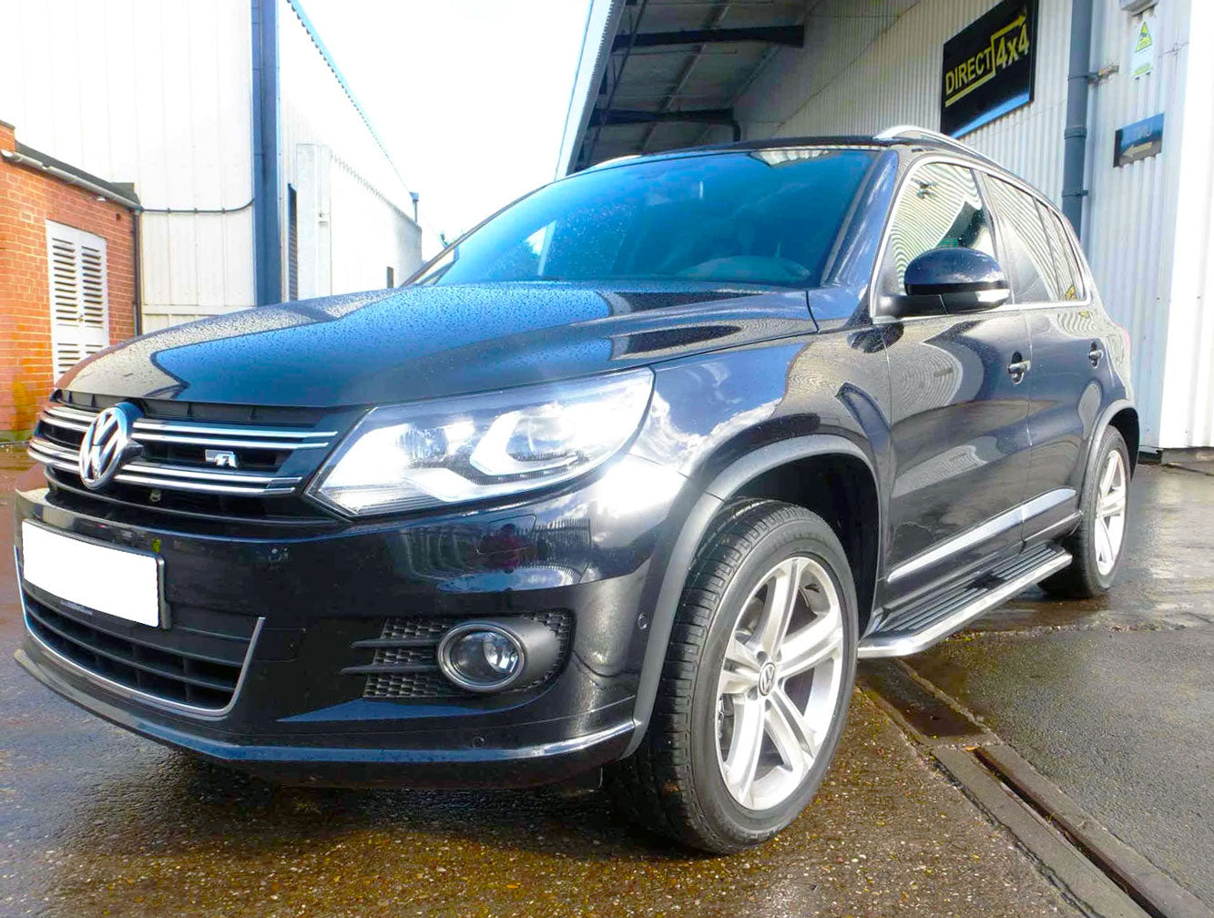 VW Tiguan Bj. 12-15 Trittbretter "Premier" - Direct 4x4 Autozubehör