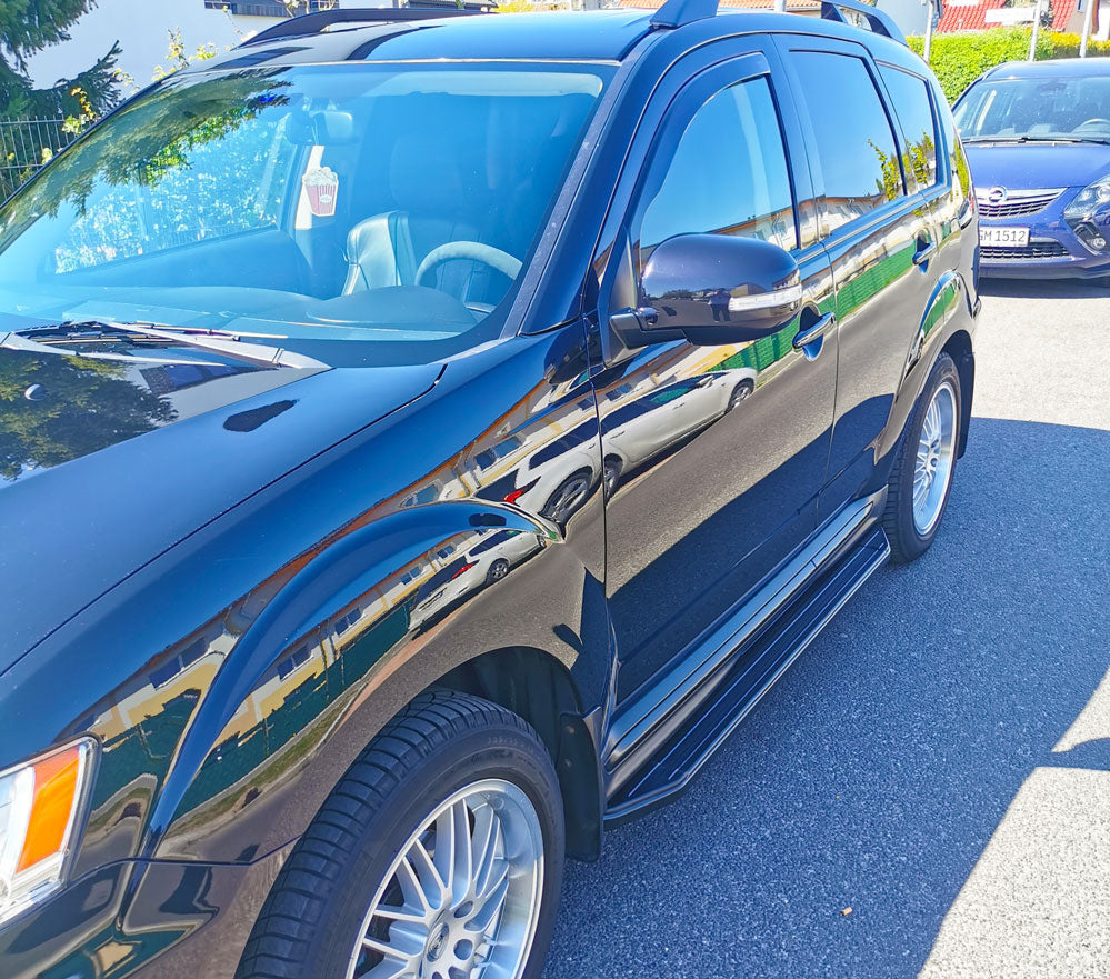 Mitsubishi Outlander Bj. 10-12 Trittbretter "Raptor Schwarz" - Direct 4x4 Autozubehör