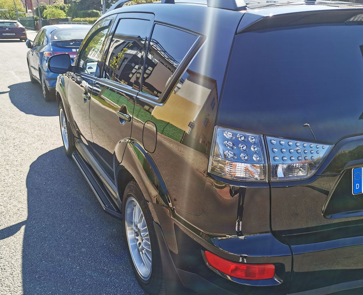 Mitsubishi Outlander Bj. 10-12 Trittbretter "Raptor Schwarz" - Direct 4x4 Autozubehör